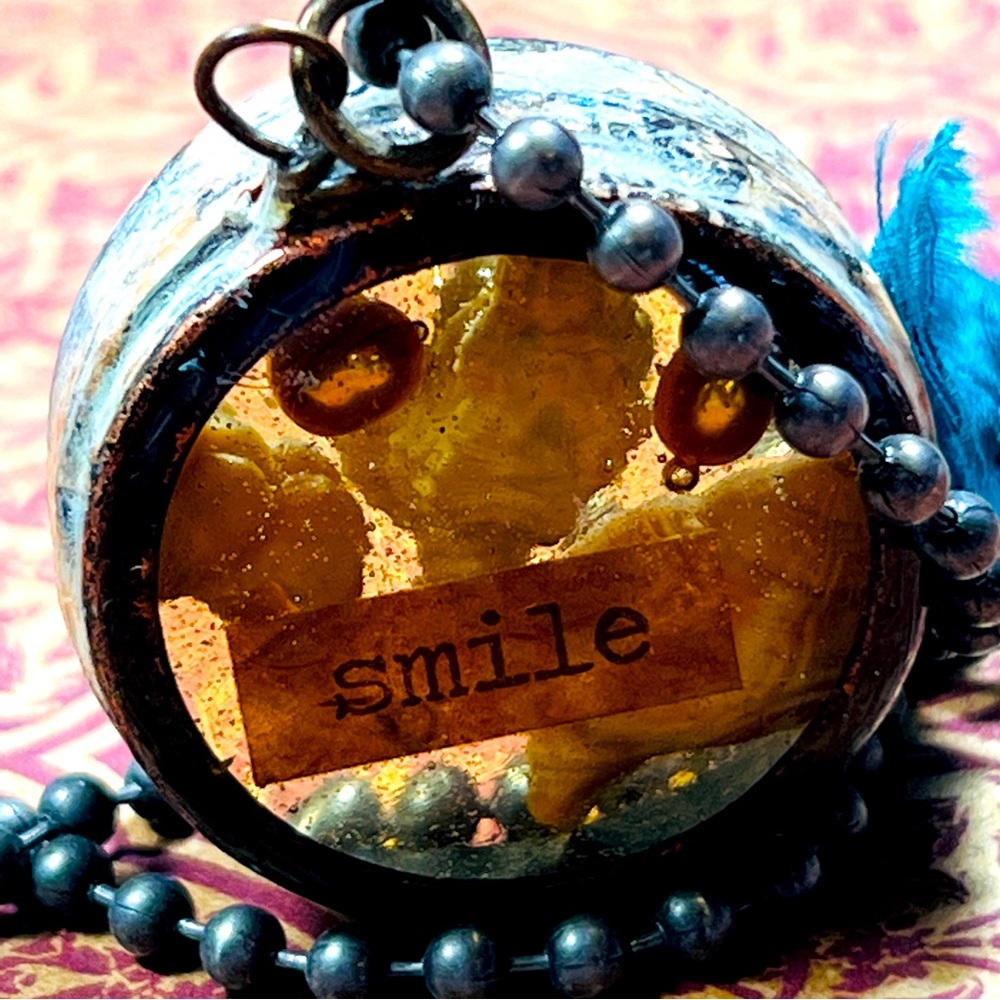SMILE: Miniature nature scape made/resin poured over beads+natural materials.